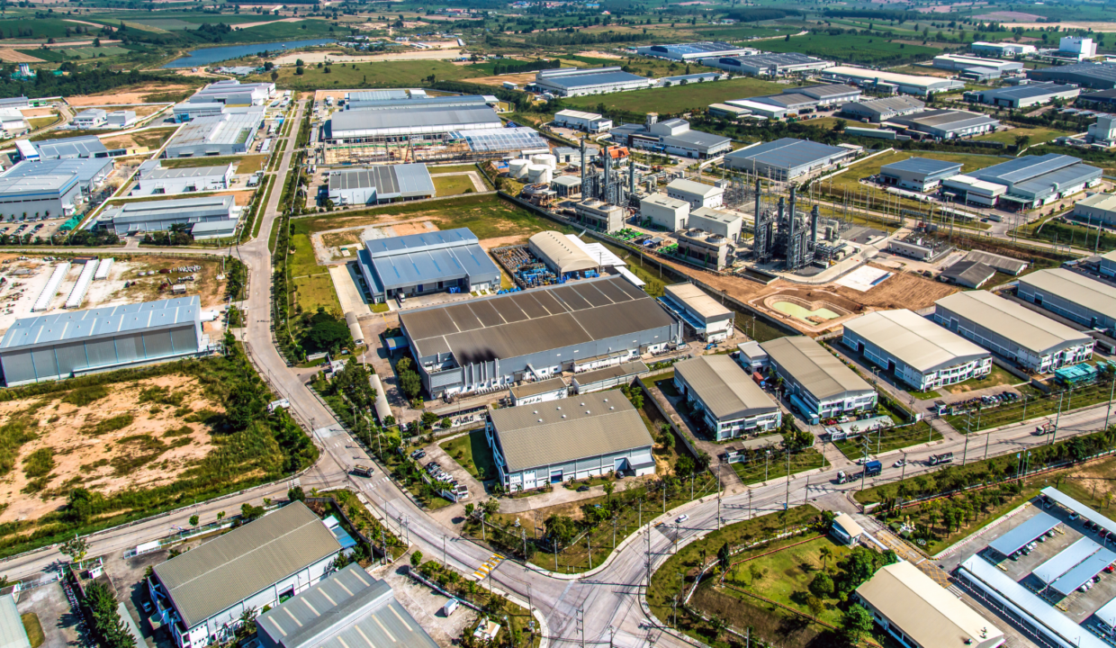 Aerial view of industrial land and factories, reflecting Indonesia industrial land sales trends and economic outlook for 2025.