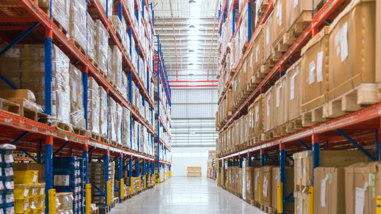 Modern warehouse interior with neatly organized shelves filled with goods, showcasing the growth and efficiency of Indonesia's warehousing industry.