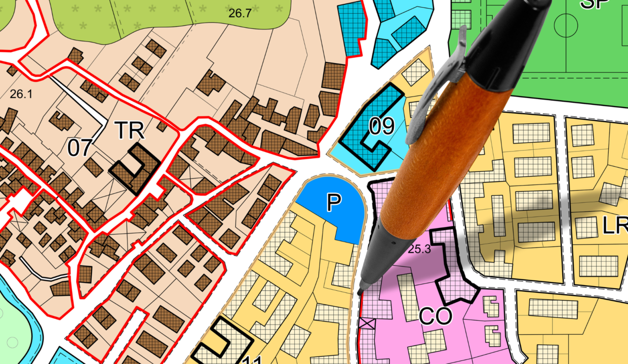 Illustration of Bali land zoning map highlighting different zones including residential, commercial, and tourism areas with a pen pointing at a commercial zone.