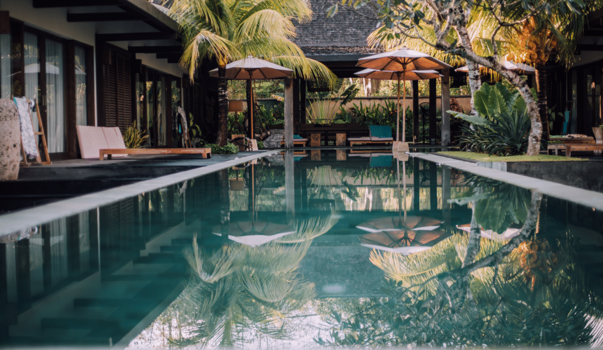 Luxury tropical villa with private pool and lush garden, showcasing off-plan property potential in Bali.