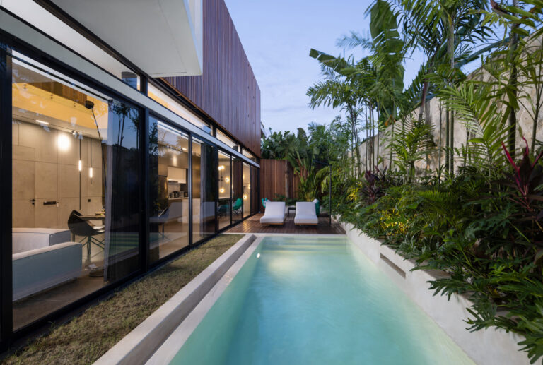 Modern villa in Canggu with private pool, tropical garden, and sleek design, ideal for those looking to buy property in Bali.